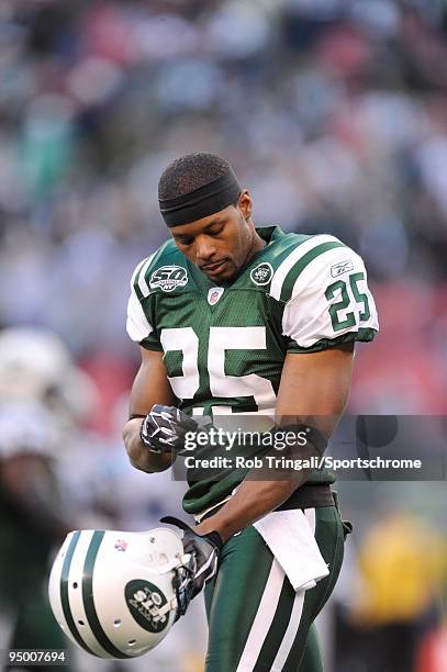 Kerry Rhodes of the New York Jets looks on against the Carolina Panthers at Giants Stadium on November 29, 2009 in East Rutherford, New Jersey. The...