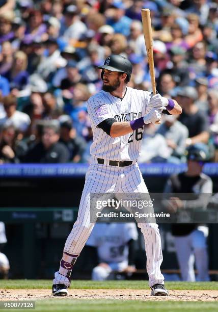 Colorado Rockies outfielder David Dahl bats during a regular season MLB game between the Colorado Rockies and the visiting Chicago Cubs on April 22,...