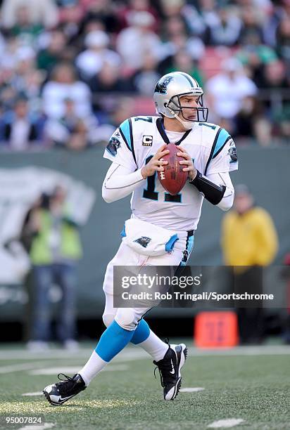Jake Delhomme of the Carolina Panthers drops back to pass against the New York Jets at Giants Stadium on November 29, 2009 in East Rutherford, New...
