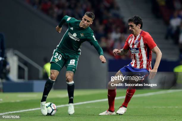 Cristian Tello of Real Betis, Stefan Savic of Atletico Madrid during the La Liga Santander match between Atletico Madrid v Real Betis Sevilla at the...