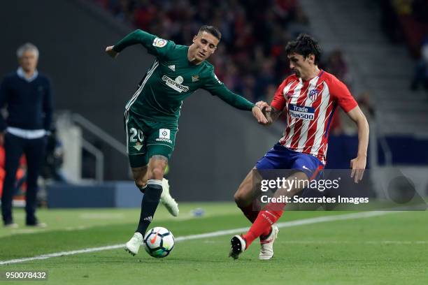 Cristian Tello of Real Betis, Stefan Savic of Atletico Madrid during the La Liga Santander match between Atletico Madrid v Real Betis Sevilla at the...