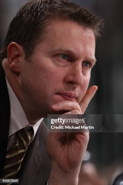 Head Coach Joe Sacco of the Colorado Avalanche watches the action from the bench against the Columbus Blue Jackets at the Pepsi Center on December...