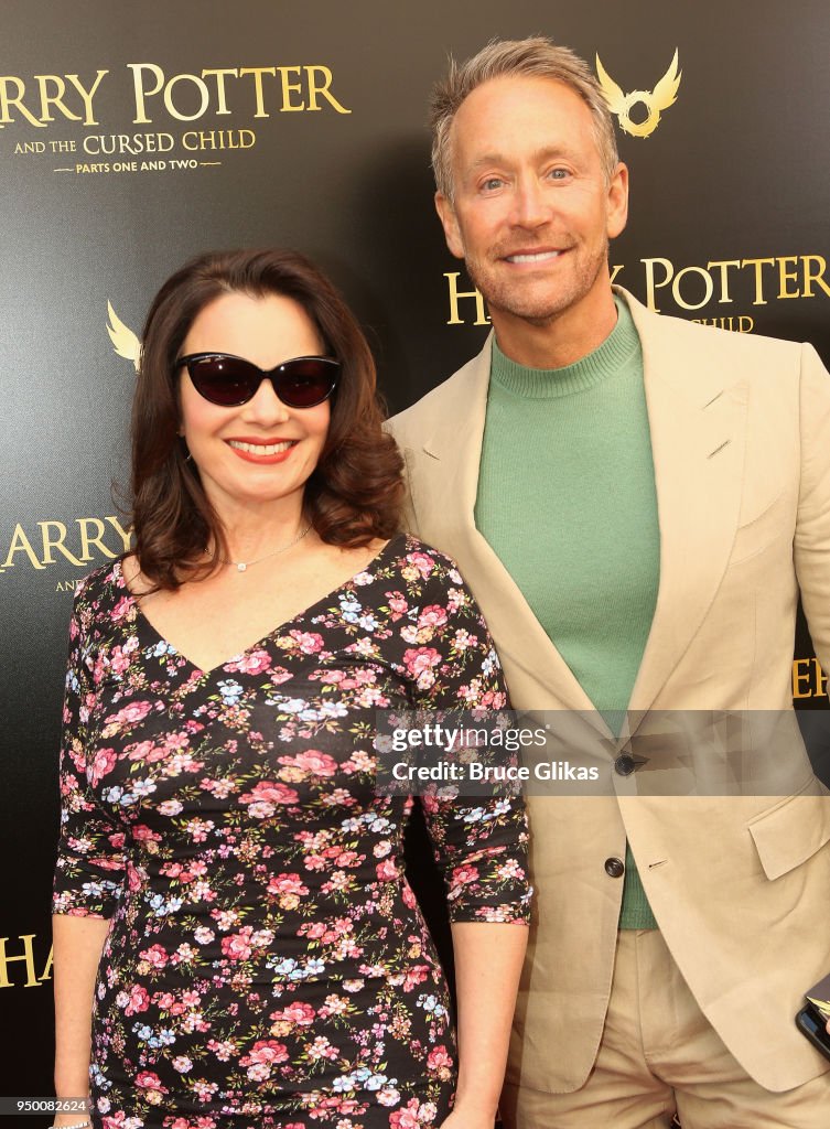 Fran Drescher and Peter Marc Jacobson pose at "Harry Potter and The
