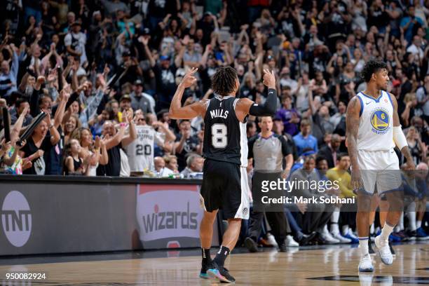 Patty Mills of the San Antonio Spurs reacts to a play in Game Four of the Western Conference Quarterfinals against the Golden State Warriors during...