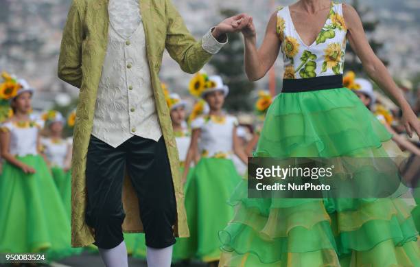 Hundreds of flower dancers of all age accompanied by huge floral floats parade take part of the 2018 edition of Flower Parade through the main...