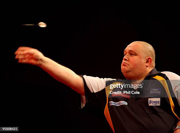 Andy Smith of England in action against Darin Young of the USA during the 2010 Ladbrokes.com World Darts Championship Round One at Alexandra Palace...