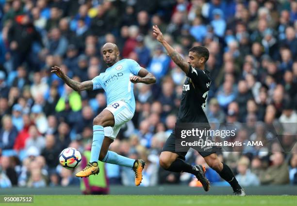 Fabian Delph of Manchester City and Kyle Naughton of Swansea City during the Premier League match between Manchester City and Swansea City at Etihad...