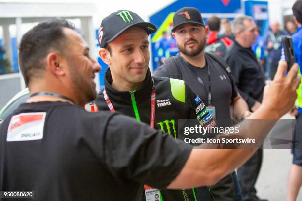Monster Yamaha Tech 3 Johann Zarco takes a selfie photo with a fan during the MotoGP Red Bull U.S. Grand Prix of The Americas - Qualifying at Circuit...
