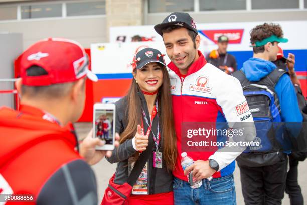Alma Pramac Racing Danilo Petrucci takes a photo with a fan during the MotoGP Red Bull U.S. Grand Prix of The Americas - Qualifying at Circuit of The...