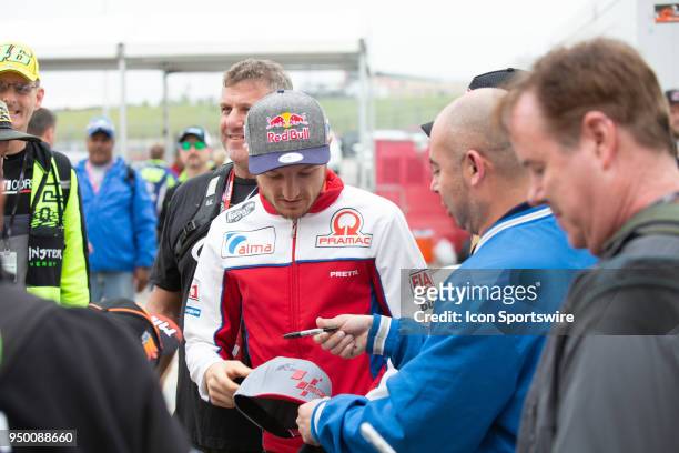 Alma Pramac Racing Jack Miller signs autograph for fans during the MotoGP Red Bull U.S. Grand Prix of The Americas - Qualifying at Circuit of The...