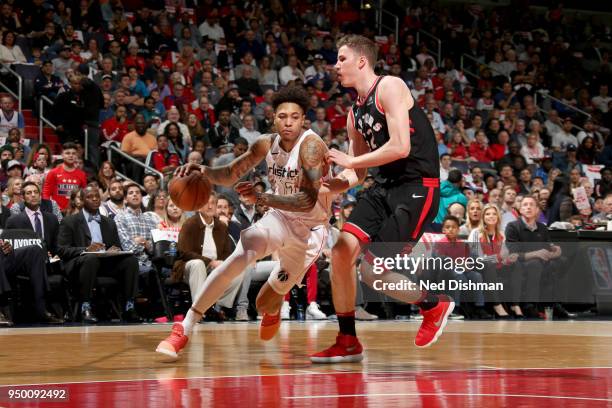 Kelly Oubre Jr. #12 of the Washington Wizards drives to the basket against the Toronto Raptors in Game Four of Round One of the 2018 NBA Playoffs on...