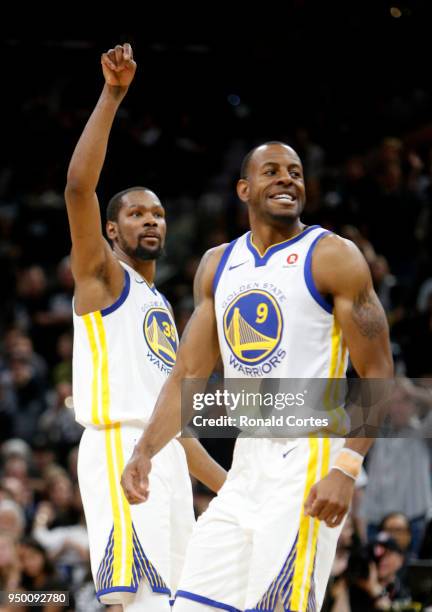 Andre Iguodala watches a three point shot by Kevin Durant of the Golden State Warriors go wide in the game against the San Antonio Spurs in the...