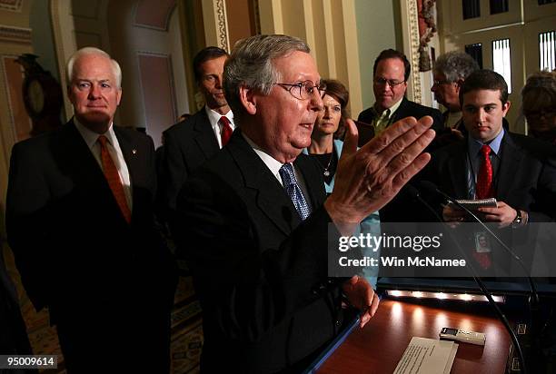 Senate Minority Leader Mitch McConnell speaks to members of the press after the Republican weekly policy luncheon at the U.S. Capitol December 22,...