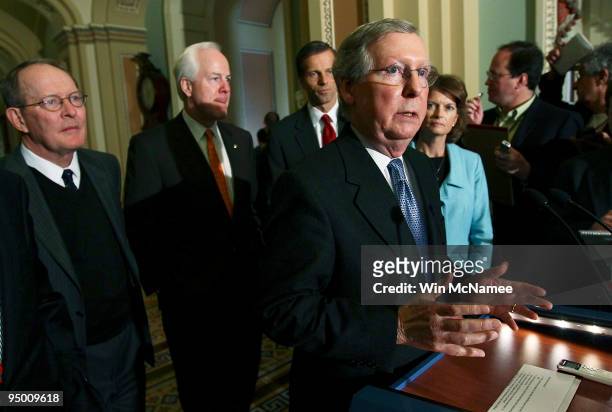 Senate Minority Leader Mitch McConnell speaks to members of the press after the Republican weekly policy luncheon at the U.S. Capitol December 22,...