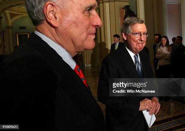 Senate Minority Leader Mitch McConnell arrives to speak to members of the press with Sen. Jon Kyl after the Republican weekly policy luncheon at the...