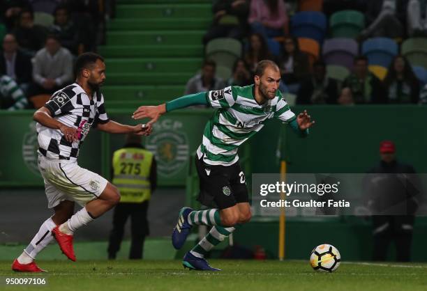 Sporting CP forward Bas Dost from Holland with Boavista FC defender Robson from Brazil in action during the Primeira Liga match between Sporting CP...