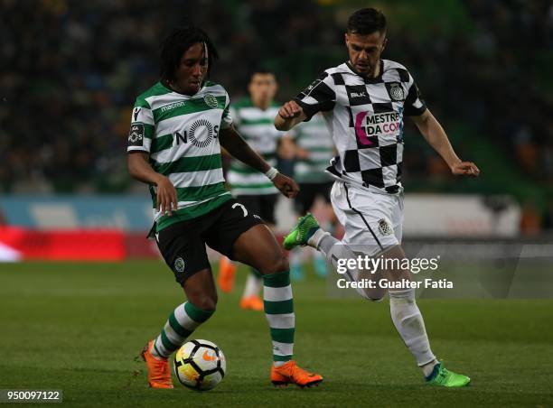 Sporting CP forward Gelson Martins from Portugal with Boavista FC defender Talocha from Portugal in action during the Primeira Liga match between...