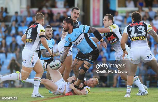 Andrew Fifita of the Sharks looks to pass the ball during the round seven NRL match between the Cronulla Sharks and the Penrith Panthers at Southern...