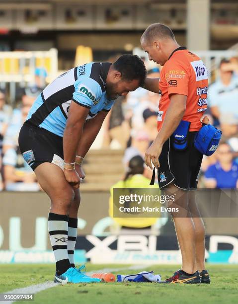 Joseph Paulo of the Sharks suffers an injury during the round seven NRL match between the Cronulla Sharks and the Penrith Panthers at Southern Cross...