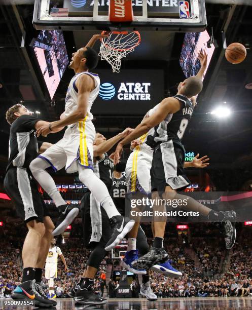 Shaun Livingston of the Golden State Warriors and Tony Parker of the San Antonio Spurs battle for a rebound in the second half of Game Four of Round...