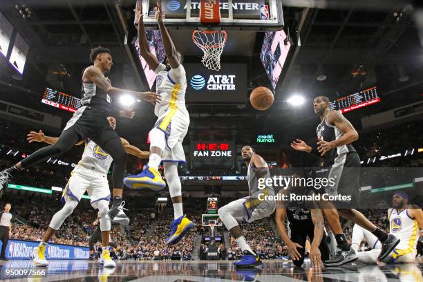 Dejounte Murray passes off to LaMarcus Aldridge of the San Antonio Spurs during game against the Golden State Warriors in the second half of Game...