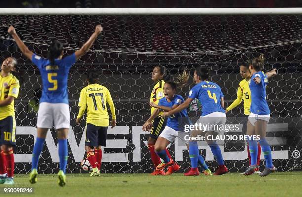 Brazil's player Monica Hickmann celebrates after scoring against Colombia during the women's Copa America match at La Portada stadium in Serena,...