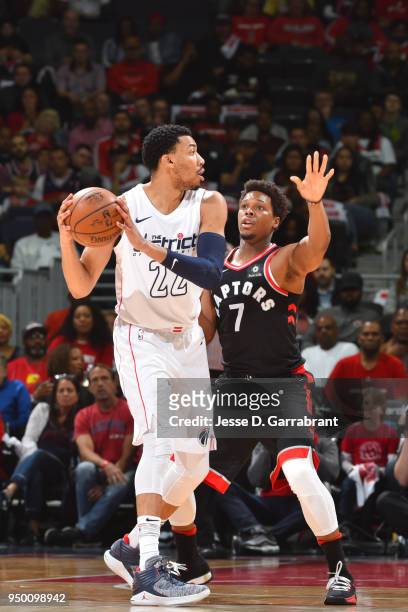 Otto Porter Jr. #22 of the Washington Wizards handles the ball against the Toronto Raptors in Game Four of Round One of the 2018 NBA Playoffs on...