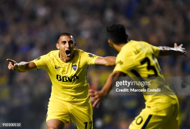 Ramon Abila of Boca Juniors celebrates with teammate Emanuel Reynoso after scoring the first goal of his team during a match between Boca Juniors and...