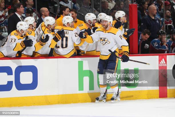 Mattias Ekholm of the Nashville Predators celebrates a goal against the Colorado Avalanche with his bench in Game Six of the Western Conference First...