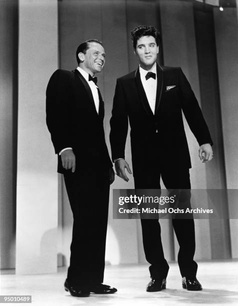 Crooner Frank Sinatra welcomes back Rock and Roll star Elvis Presley after his stint in the US army on his self titled TV variety show on March 26,...