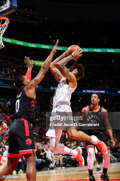 Otto Porter Jr. #22 of the Washington Wizards shoots the ball against the Toronto Raptors in Game Four of Round One of the 2018 NBA Playoffs on April...