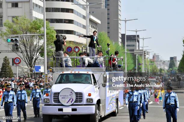 Sochi and PyeongChang Winter Olympic Games Figure Skating Men's Single gold medalist Yuzuru Hanyu waves to supporters during the parade on April 22,...