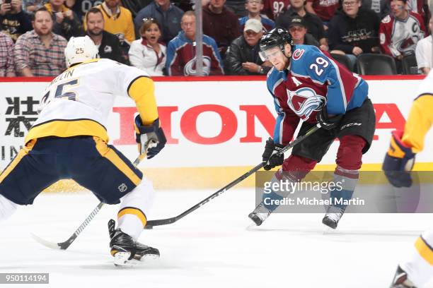 Nathan MacKinnon of the Colorado Avalanche skates against Alexei Emelin of the Nashville Predators in Game Six of the Western Conference First Round...