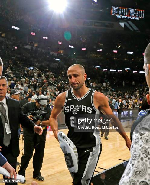 Manu Ginobili of the San Antonio Spurs leaves the court a win against the Golden State Warriors of Game Four of Round One of the 2018 NBA Playoffs at...