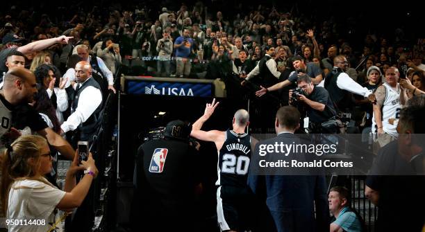Manu Ginobili of the San Antonio Spurs leaves the court after a win against the Golden State Warriors in Game Four of Round One of the 2018 NBA...