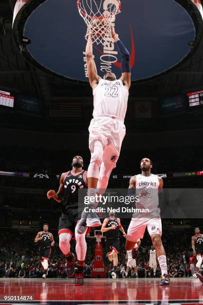 Otto Porter Jr. #22 of the Washington Wizards goes to the basket against the Toronto Raptors in Game Four of Round One of the 2018 NBA Playoffs on...