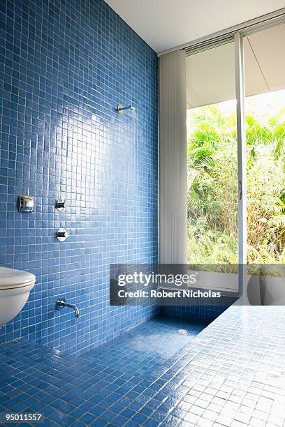 modern tiled shower - blue bathroom stock pictures, royalty-free photos & images