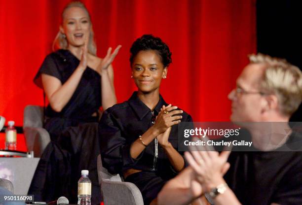 Actors Pom Klementieff, Letitia Wright, and Paul Bettany at the Avengers: Infinity War Press Junket in Los Angeles, CA April 22nd, 2018