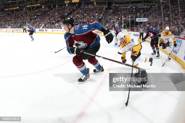 Nikita Zadorov of the Colorado Avalanche skates against Calle Jarnkrok of the Nashville Predators in Game Six of the Western Conference First Round...