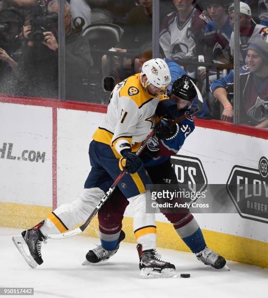 Colorado Avalanche left wing Gabriel Landeskog and Nashville Predators left wing Austin Watson get tangled up in the second period during game 6 of...