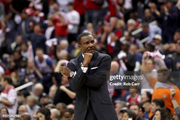 Head coach Dwane Casey of the Toronto Raptors motions from the bench in the second half against the Washington Wizards during Game Four of Round One...