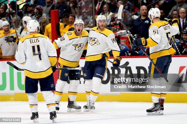 Ryan Ellis, Colton Sissons, Mattias Ekholm and Austin Wilson of the Nashville Predators celebrate a goal against the Colorado Avalanche in Game Six...