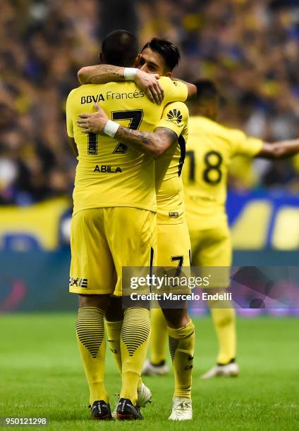 Cristian Pavon of Boca Juniors celebrates with Ramon Abila after scoring the third goal of his team during a match between Boca Juniors and Newell's...