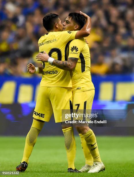 Cristian Pavon of Boca Juniors celebrates with Emanuel Reynoso after scoring the third goal of his team during a match between Boca Juniors and...