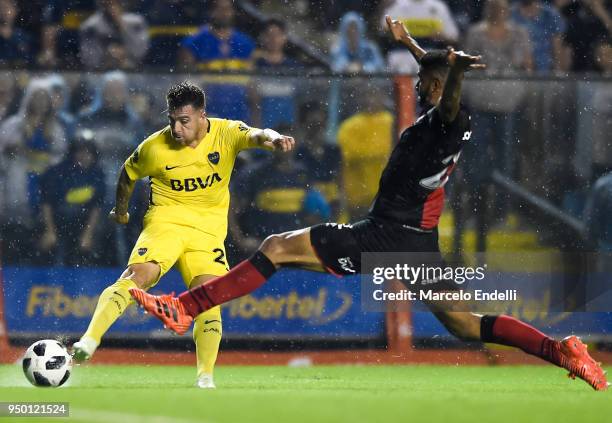 Julio Buffarini of Boca Juniors fights for the ball with Joaquin Varela of Newells Old Boys during a match between Boca Juniors and Newell's Old Boys...