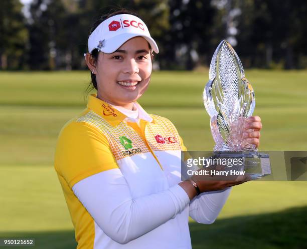 Moriya Jutanugarn of Thailand poses with the trophy after her win during round four of the Hugel-JTBC Championship at the Wilshire Country Club on...