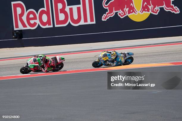 Scott Redding of Great Britain and Aprilia Racing Team Gresini leads Tom Luthi of Switzerland and and Team EG 0,0 Marc VDS during the MotoGP race...