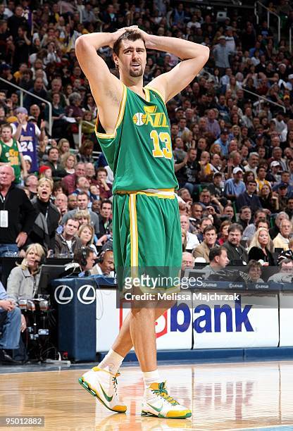 Mehmet Okur of the Utah Jazz reacts after a play during the game against the Los Angeles Lakers at the EnergySolutions Arena on December 12, 2009 in...