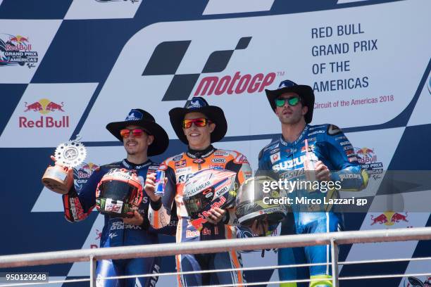 Maverick Vinales of Spain and Movistar Yamaha MotoGP, Marc Marquez of Spain and Repsol Honda Team and Andrea Iannone of Italy and Team Suzuki ECSTAR...