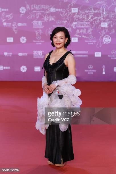 Actress Joan Chen Chong poses on red carpet of the closing ceremony of the 8th Beijing International Film Festival and the Award Ceremony of Tiantan...